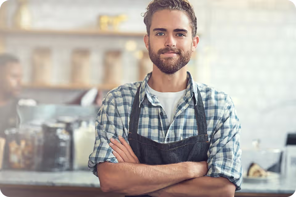 A man in an apron stands in a café or small eatery, representing hospitality and retail SMEs. ccMonet’s AI - powered financial tools (bookkeeping, dashboards) and industry - tailored services, plus expert support (tax compliance, business registration), help such businesses manage finances efficiently.
