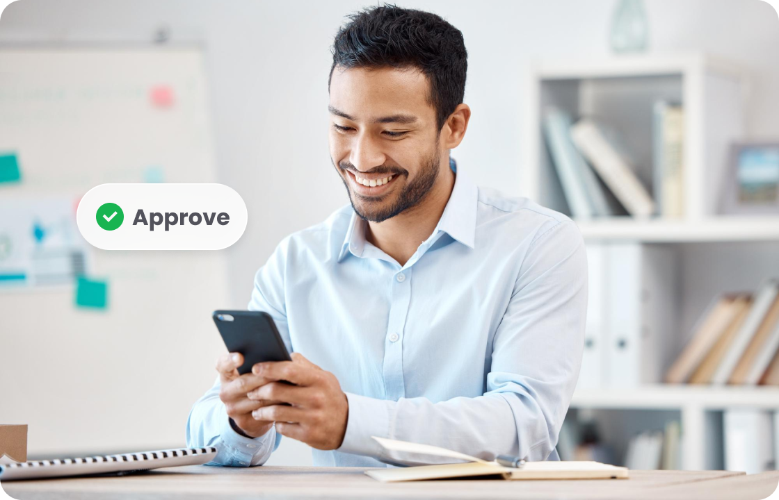 A man in a light - blue shirt uses a phone to approve tasks, with an “Approve” tag. It represents SME users of ccMonet—our AI - powered financial tools (bookkeeping, dashboards) and expert services (compliance, tax support) help them efficiently manage approval workflows and financial operations.