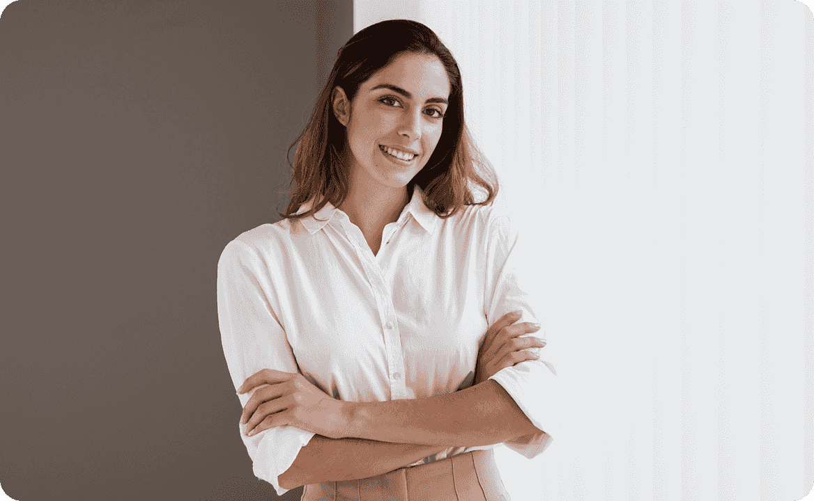 A woman in a white shirt stands with crossed arms, representing ccMonet’s financial experts. She embodies our team’s proficiency in using AI - powered tools to help SMEs manage bookkeeping, ensure financial data accuracy, and provide industry - tailored workflow solutions.